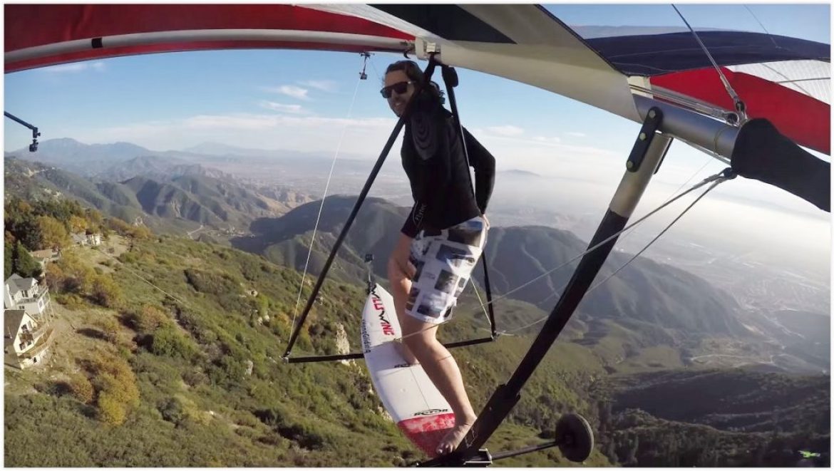 Wolfgang pilote un deltaplane avec une planche de surf